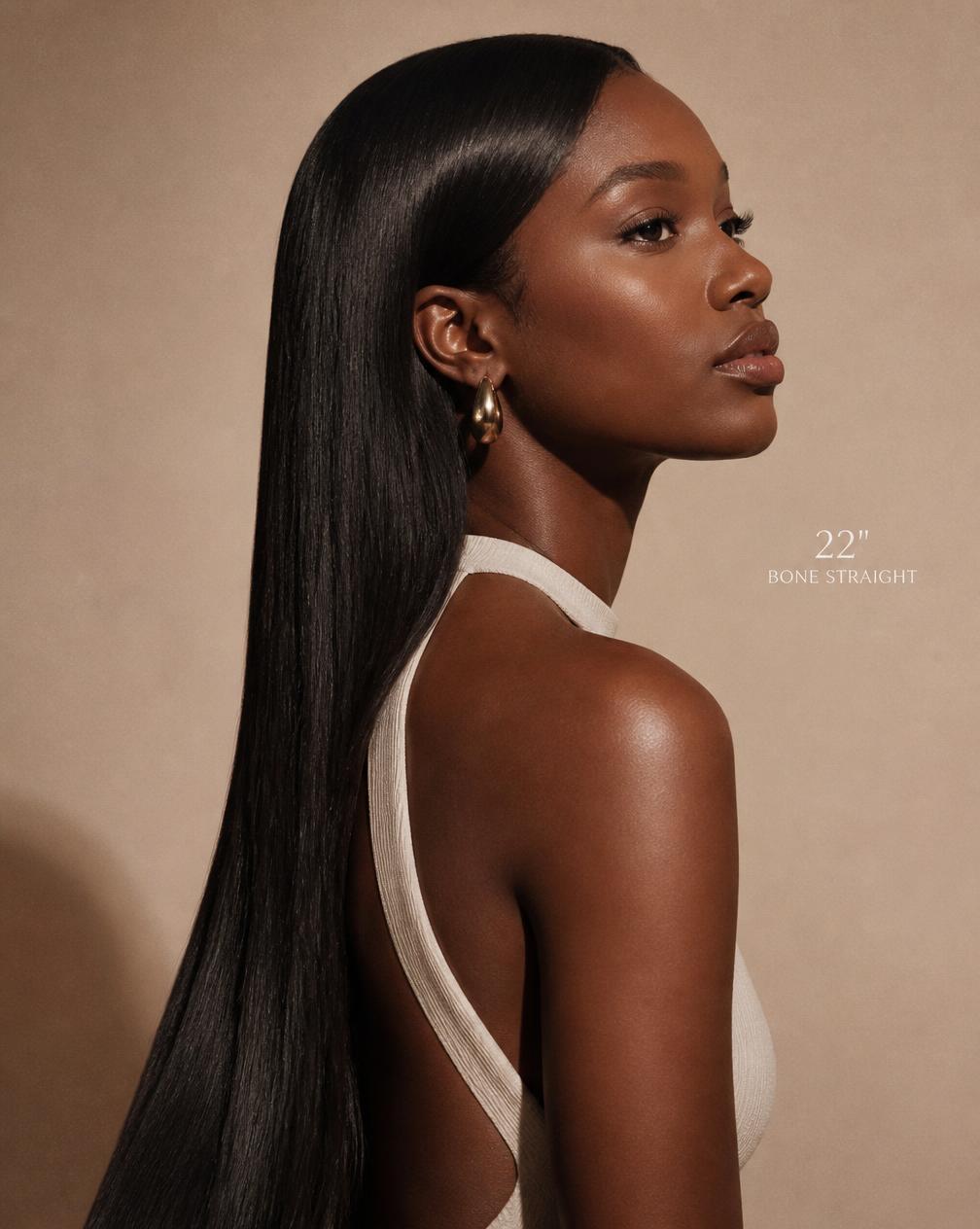 Client in profile wearing long silky straight Zefi hair